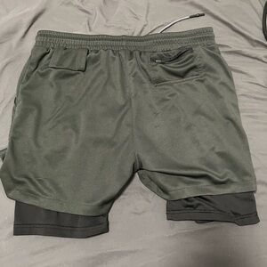 Gym shorts size Large fits 30 to 34 waist with cellphone pocket